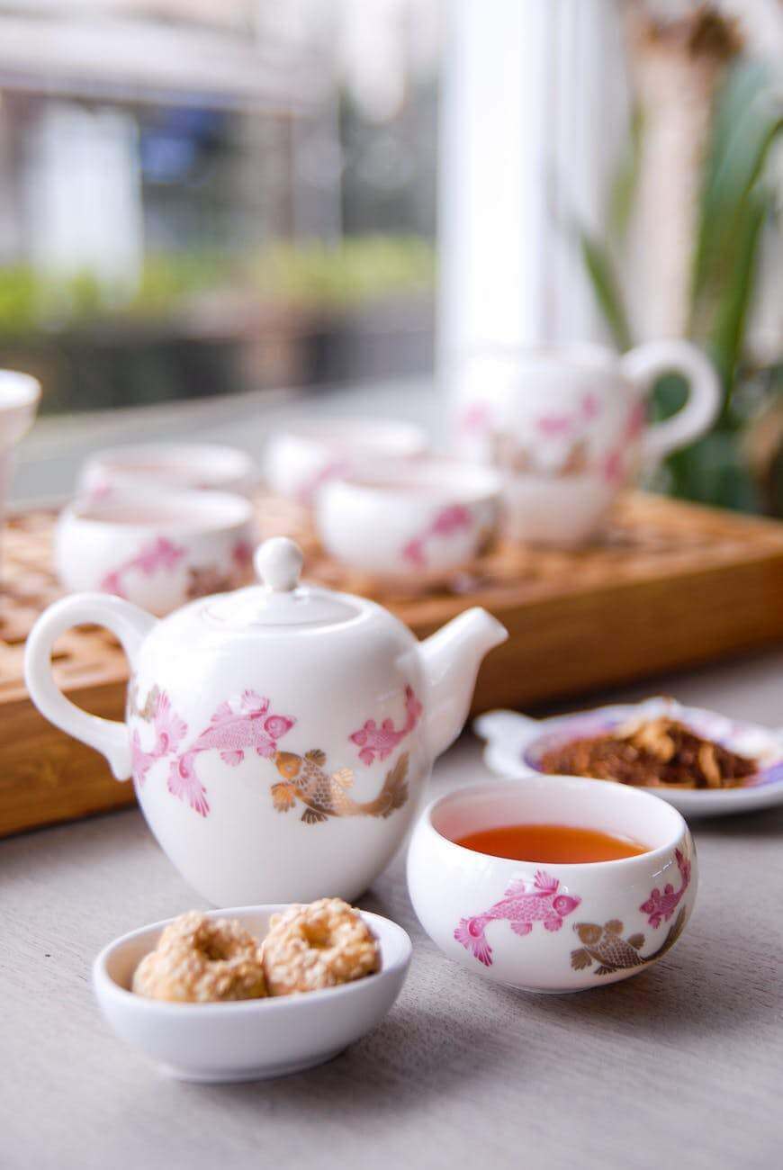 ceramic tea set with biscuits