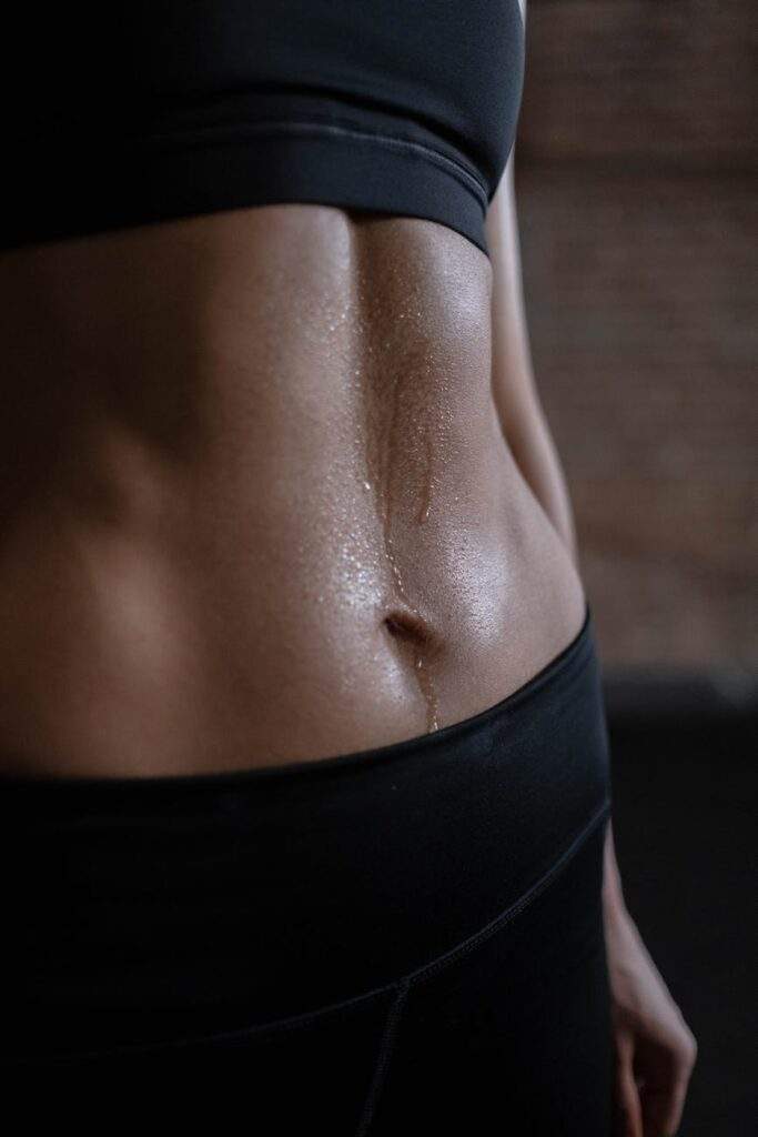 close up view of a person s abs