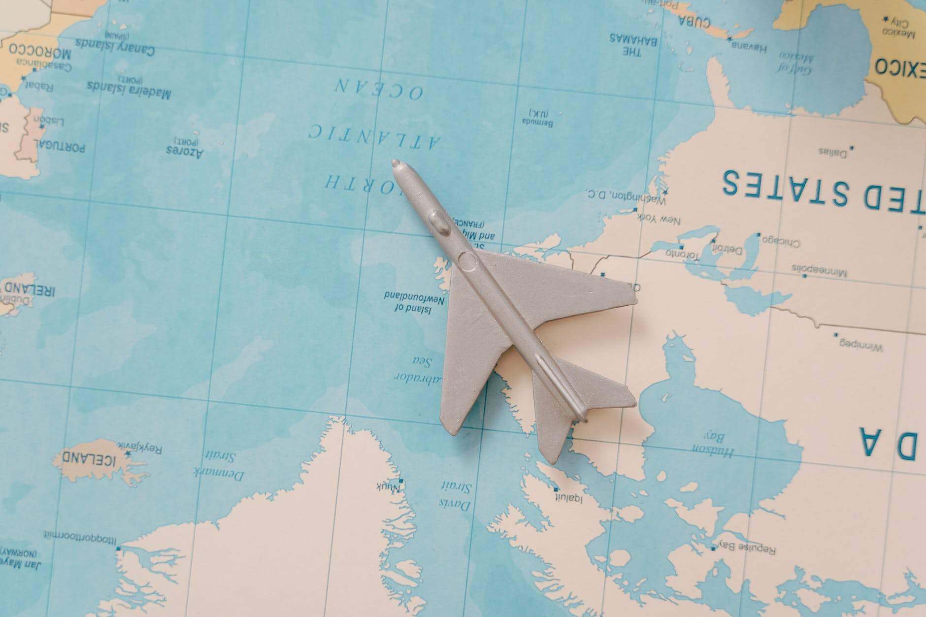 airplane toy on a map