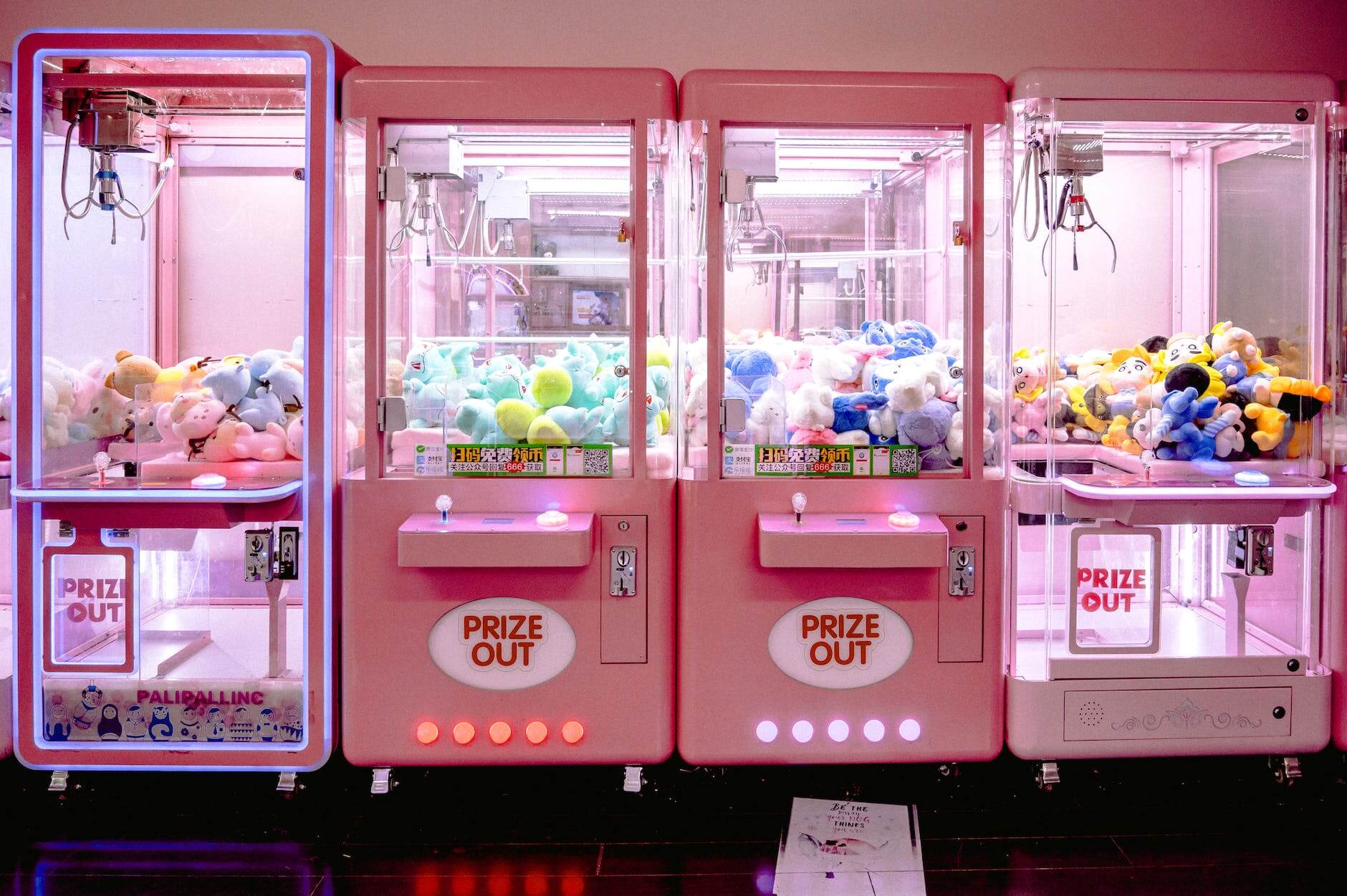 pink claw machines with soft toys